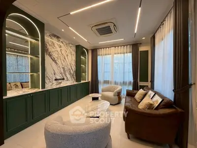 Luxurious living room with elegant marble accents and modern furniture