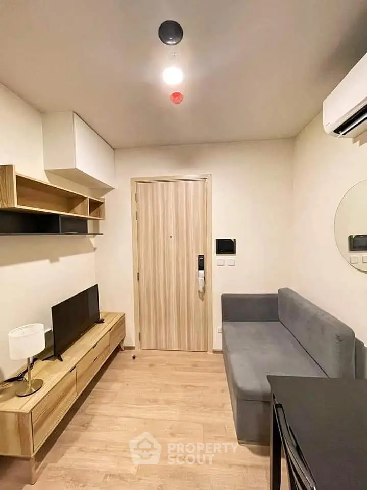 Modern living room with sleek furniture and minimalist design