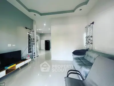 Spacious modern living room with sleek furniture and elegant decor