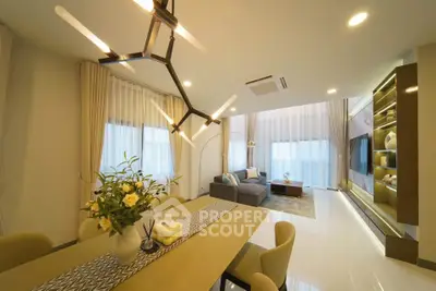 Modern living room with elegant lighting and stylish decor