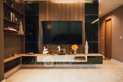 Stylish modern living room with large TV and elegant decor