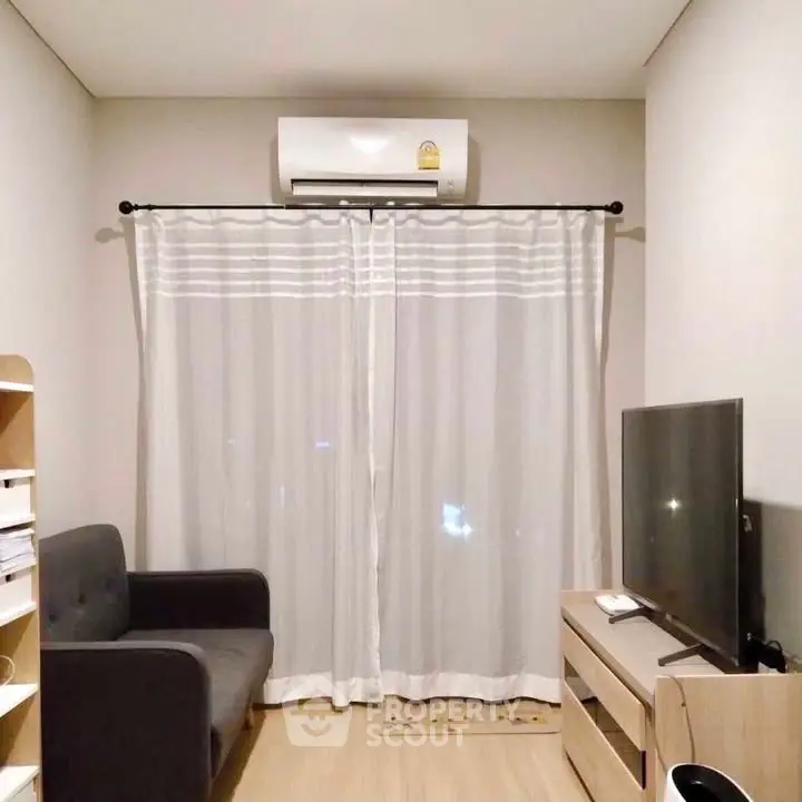 Cozy living room with air conditioning and modern decor