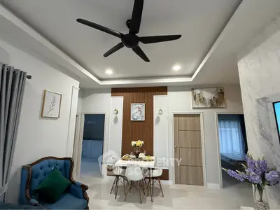 Modern living room with elegant dining area and stylish decor