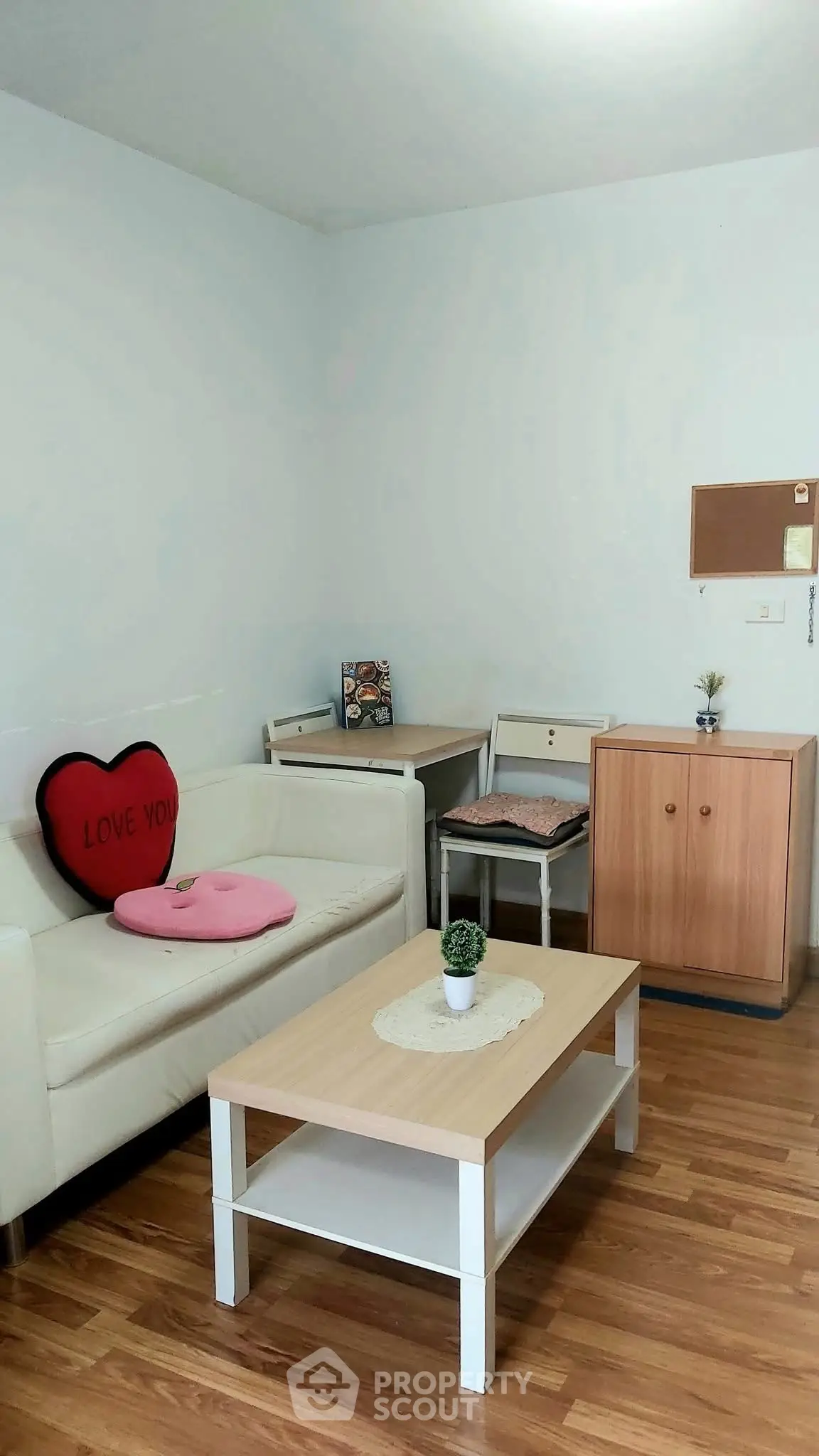 Cozy living room with modern decor and wooden flooring