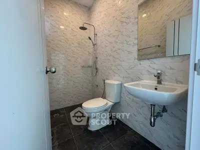 Modern bathroom with sleek fixtures and stylish tile design