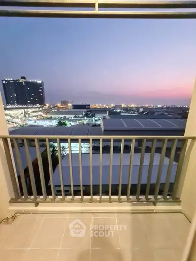 Stunning balcony view with cityscape at dusk, perfect for urban living enthusiasts.