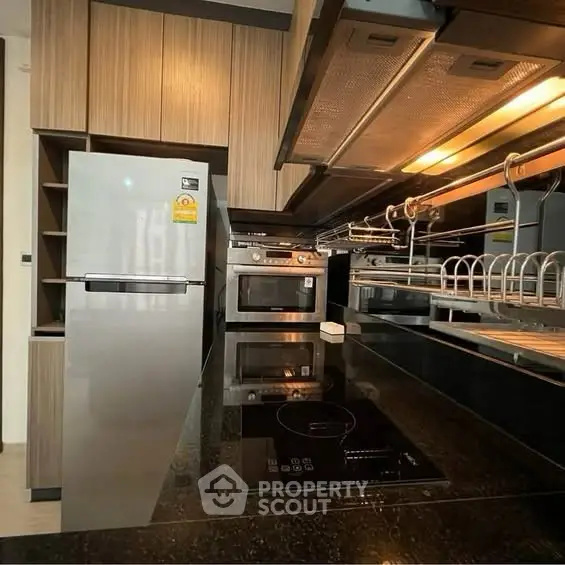 Modern kitchen with sleek appliances and stylish cabinetry