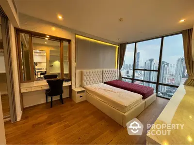 Luxurious bedroom with stunning city view and elegant furnishings