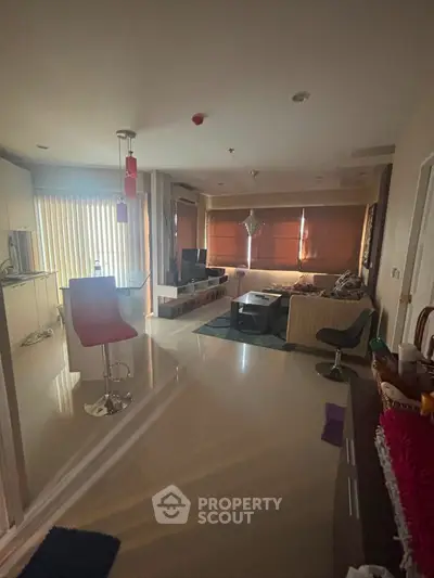 Spacious modern living room with stylish furniture and natural light