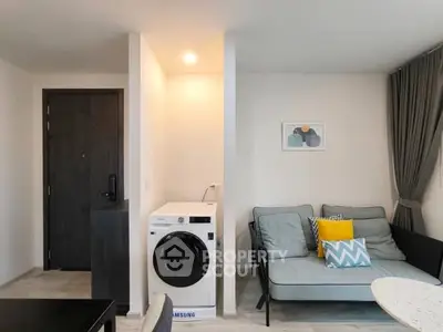 Modern living room with washing machine and stylish decor
