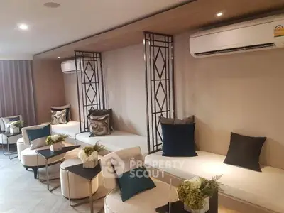 Stylish modern living room with elegant seating and air conditioning