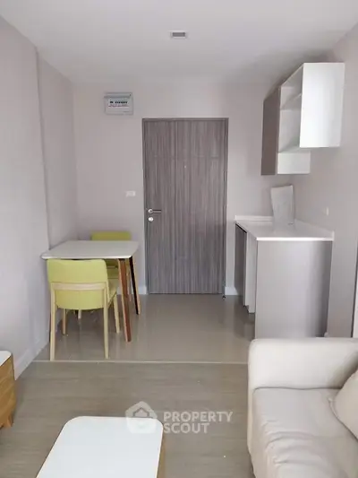 Modern compact living room with dining area and minimalist decor