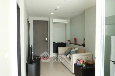 Modern living room with cozy sofa and air conditioning in a stylish apartment.