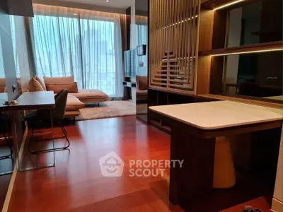 Luxurious modern living room with elegant wooden flooring and stylish furniture, perfect for urban living.