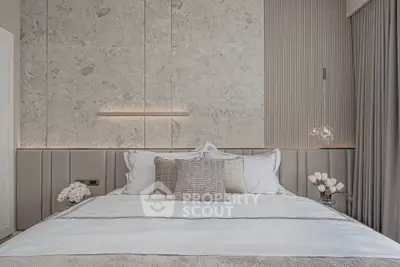 Luxurious modern bedroom with elegant decor and soft lighting