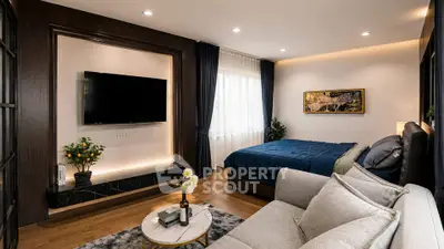 Luxurious modern bedroom with elegant decor and cozy seating area