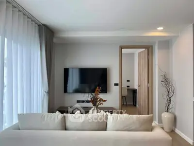 Modern living room with sleek TV setup and elegant decor