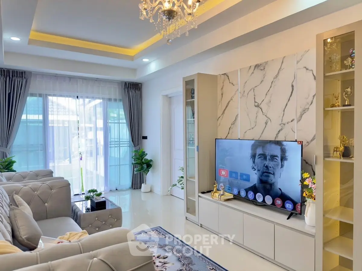 Luxurious living room with elegant decor and modern entertainment setup