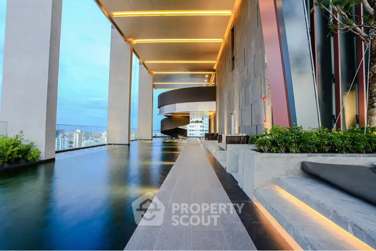 Luxurious rooftop pool with stunning city views and modern architectural design.