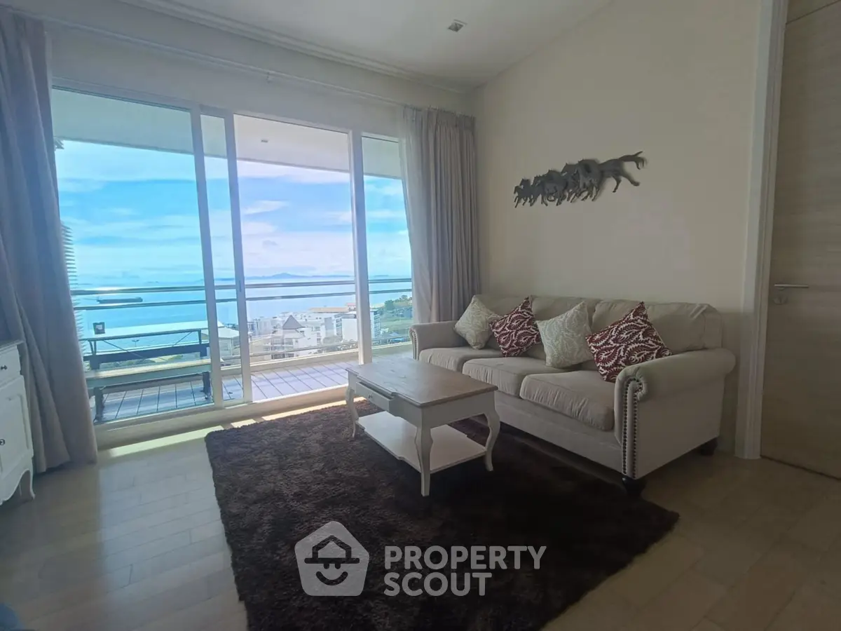 Chic living room with stunning ocean view and elegant decor