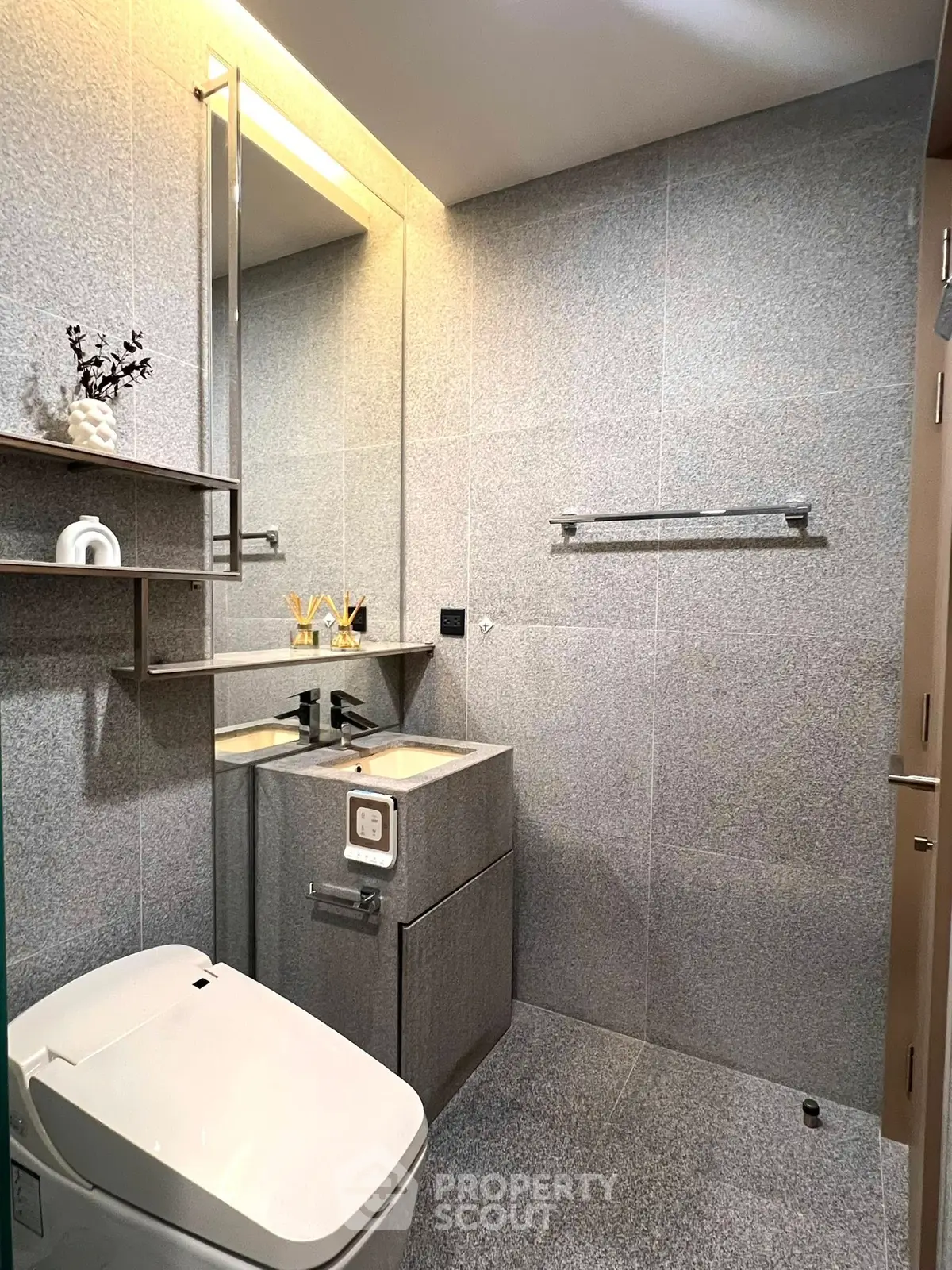 Modern bathroom with sleek fixtures and elegant lighting