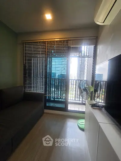 Modern living room with balcony view in urban apartment