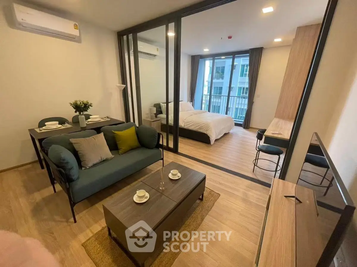 Modern studio apartment with open layout and stylish furnishings