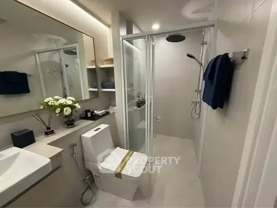 Modern bathroom with sleek shower and elegant decor