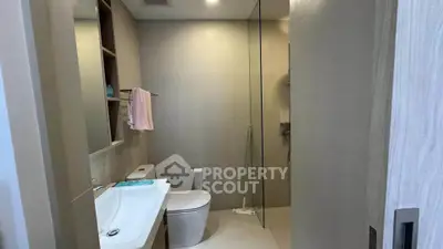 Modern bathroom with sleek design and glass shower enclosure