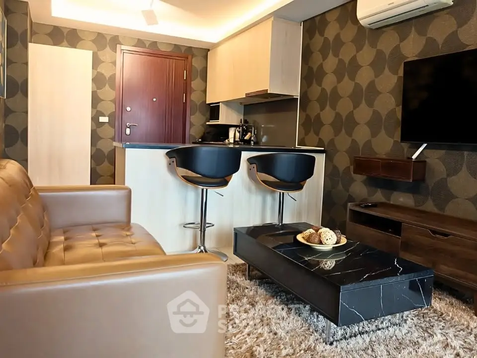 Modern living room with stylish decor and open kitchen layout