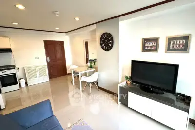 Modern living room with sleek furniture and stylish decor in a contemporary apartment.