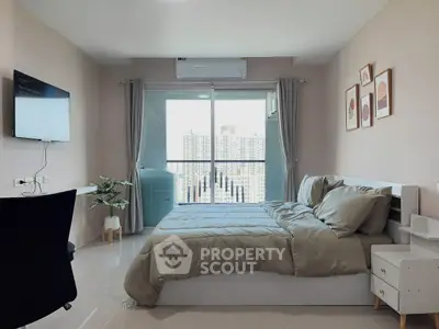 Modern bedroom with city view, featuring sleek decor and natural light.