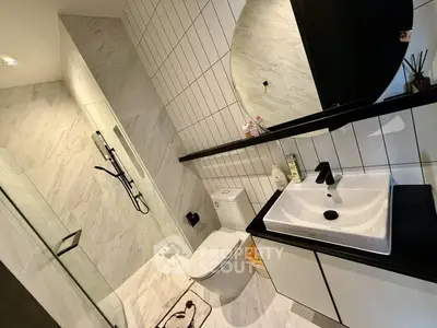 Modern bathroom with sleek fixtures and elegant tile design