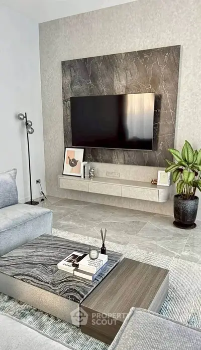 Modern living room with sleek TV setup and stylish decor