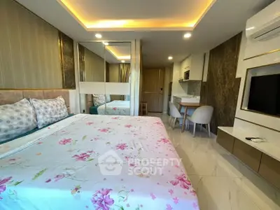 Luxurious bedroom with modern decor, featuring a cozy bed, stylish lighting, and a compact dining area.