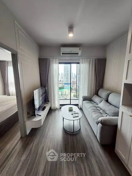 Modern living room with balcony view in stylish apartment