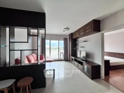 Modern living room with stylish shelving and city view