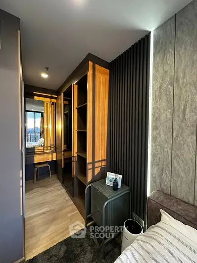 Modern bedroom with stylish decor and built-in storage