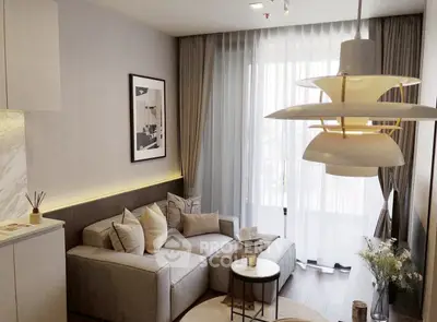 Modern living room with stylish decor and large window for natural light