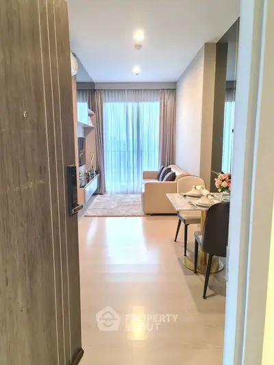 Modern living room with cozy seating and elegant decor, perfect for relaxation and entertainment.