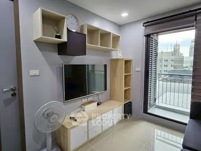 Modern living room with balcony view in urban apartment