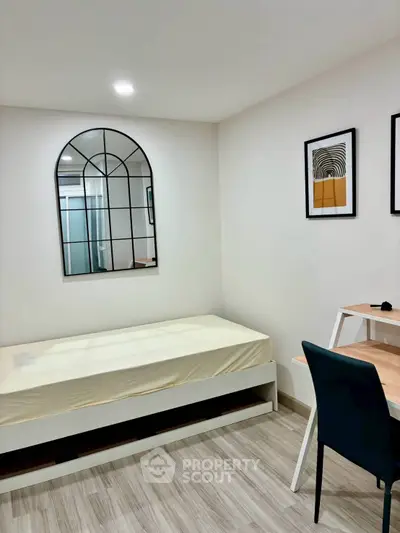 Modern minimalist bedroom with single bed and stylish decor