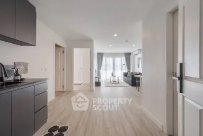 Spacious modern apartment with open layout and sleek kitchen design