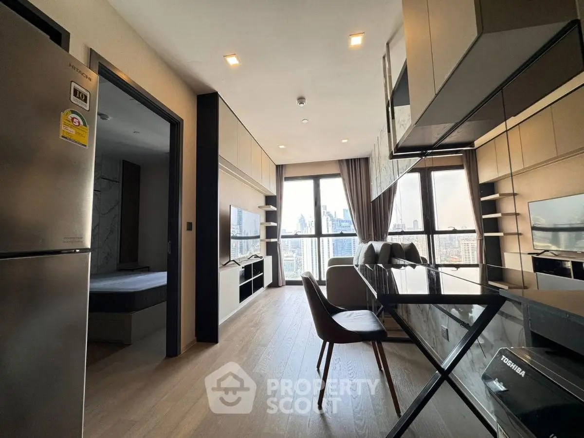 Modern apartment with open layout, sleek kitchen, and stunning city view.
