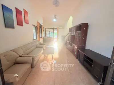 Spacious living room with elegant furniture and natural light