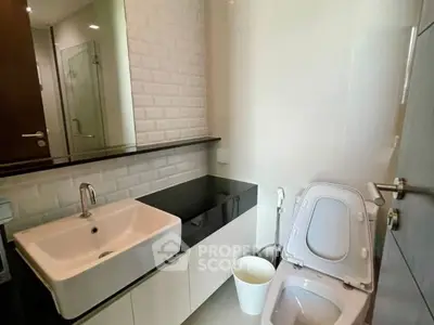 Modern bathroom with sleek sink and toilet design