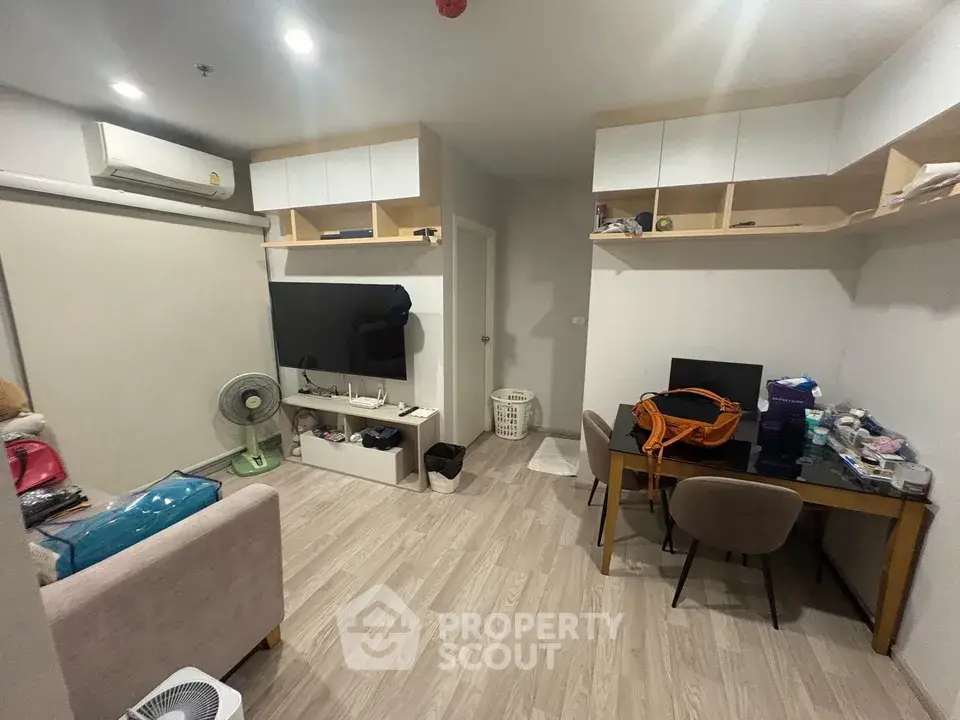 Modern living room with stylish furniture and entertainment setup