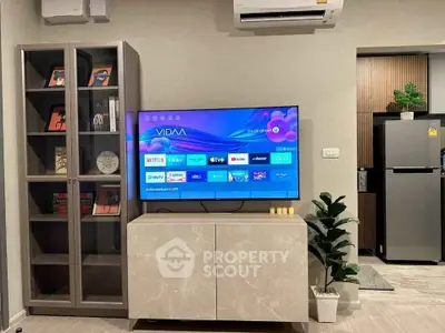 Modern living room with sleek TV setup and stylish decor