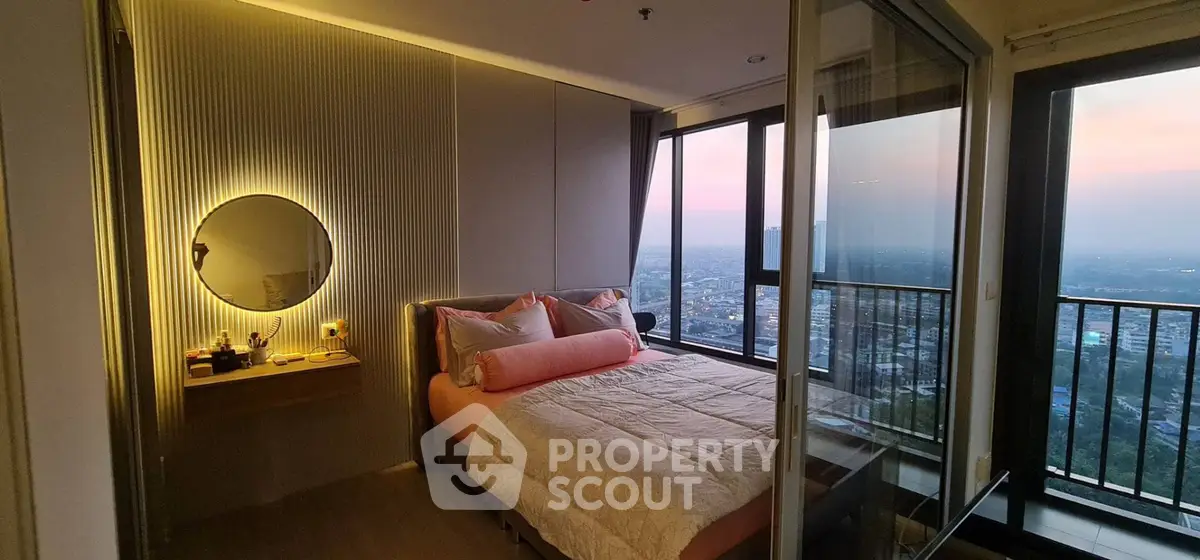 Luxurious bedroom with stunning city view and elegant decor