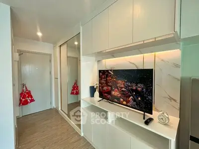 Modern living room with sleek TV setup and stylish decor